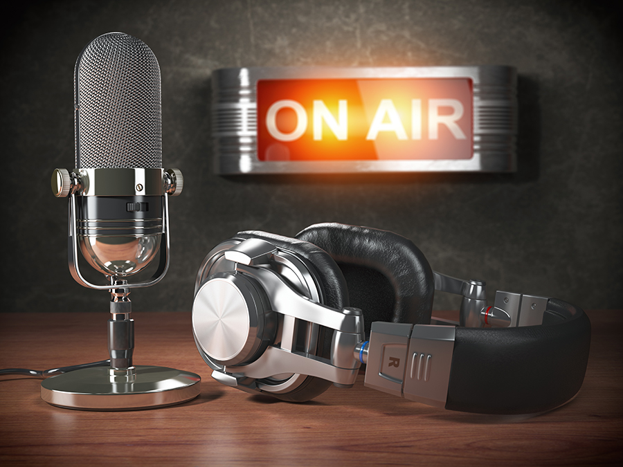 Vintage microphone  and headphones with signboard on air. Broadcasting radio station concept. 3d illustration